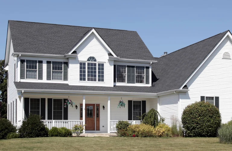 Completed GAF Timberline HDZ shingle roof replacement in Vancouver, WA showcasing architectural charcoal shingles and professional ridge venting.